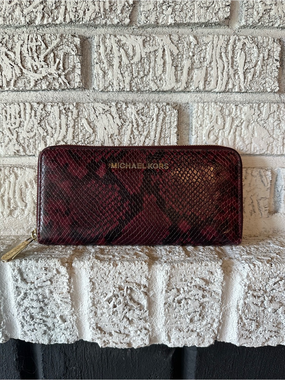Michael Kors Wine and Black Snake-Embossed Zip Wallet